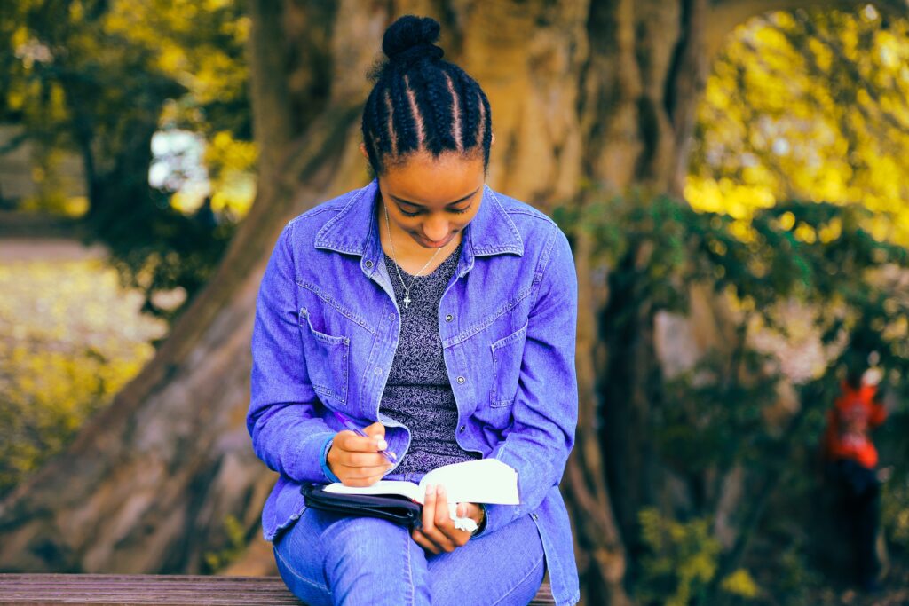 Young woman studying Bible